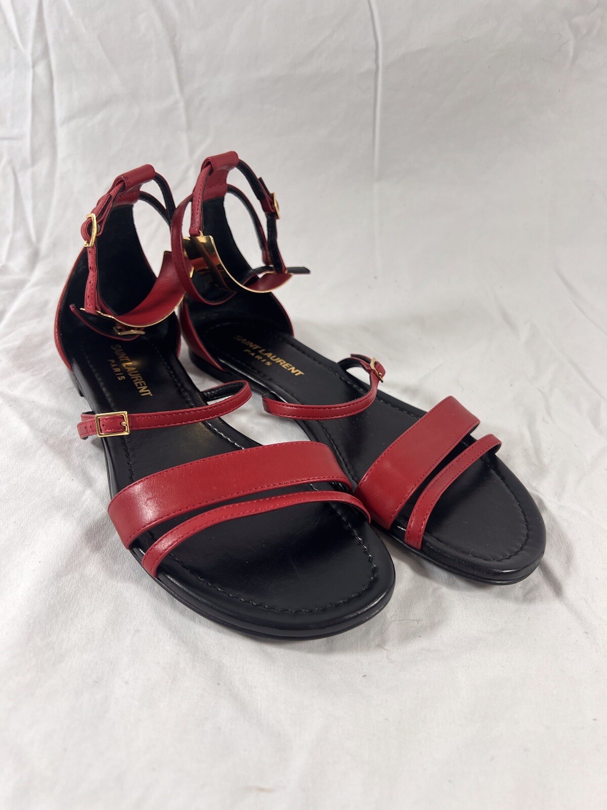 Sandali piatti Saint Laurent in pelle rossa Janis cinturino alla caviglia gladiatore 35 5 5 5 US