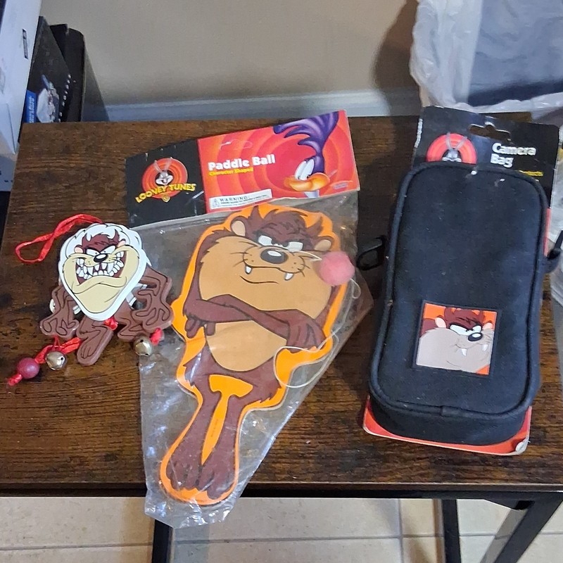Taz Christmas ornament , paddleball and camera bag lot of three items