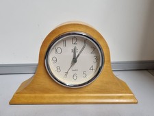 LC quartz wooden mantel clock.  13cm X 20cm