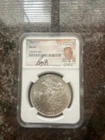 1885-O Morgan Dollar MS-65 NGC Barry Goldwater Jr Signed