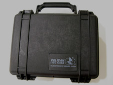 Pelican 1150 hard case with X-Pack padded lumbar waist harness for Pelican case.