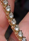 14K stamped tennis bracelet with white stones.  — photo 10