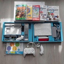 Lot Console Nintendo Wii avec 2 commandes supplémentaires 2 logiciels...
