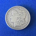 1892 Morgan Silver Dollar having VG+/VG details. A scarcer date and a nice coin.