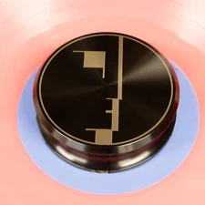 Vinyl record stabilizer weight. Bauhaus signet engraved turntable weight