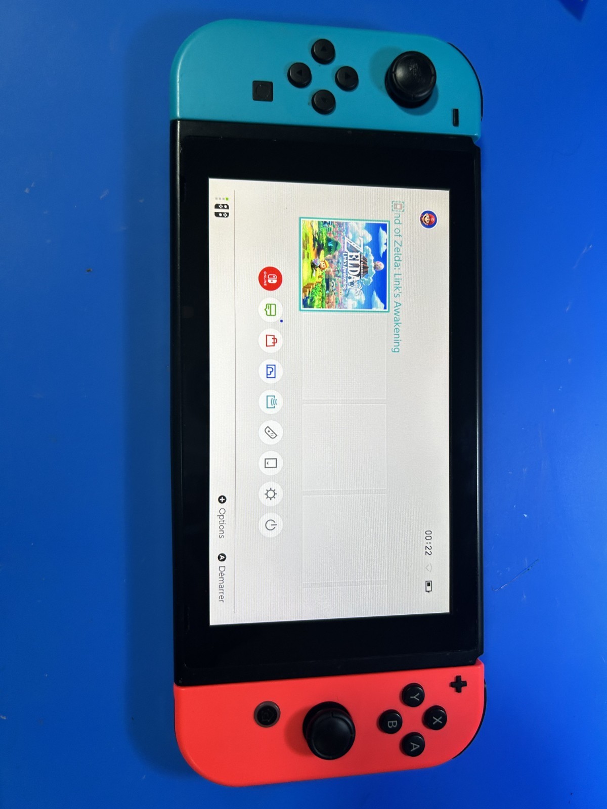 Nintendo Switch + Chargeur + Joy Cons