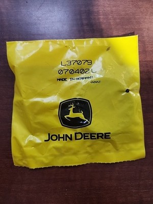 John Deere L37079 SCRAPER RING NOS OEM JD Part