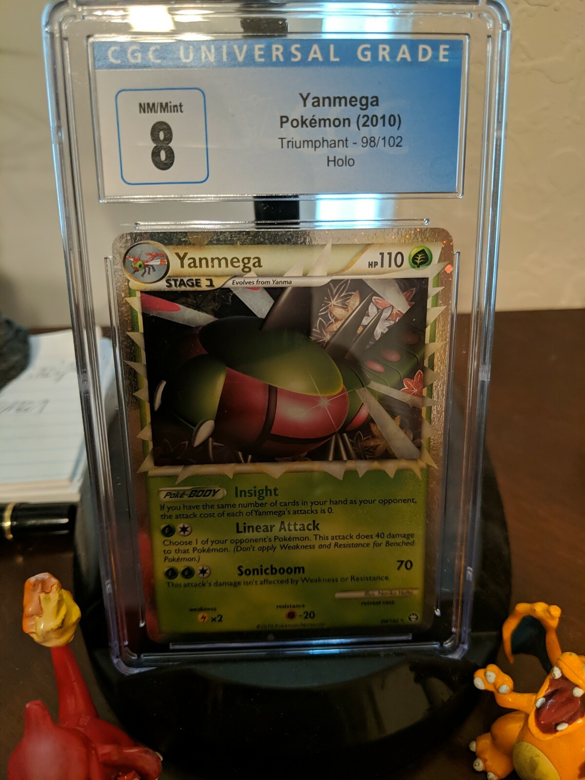 CGC 8 Yanmega Pokémon 2010 Triumphant 98/102 Holo