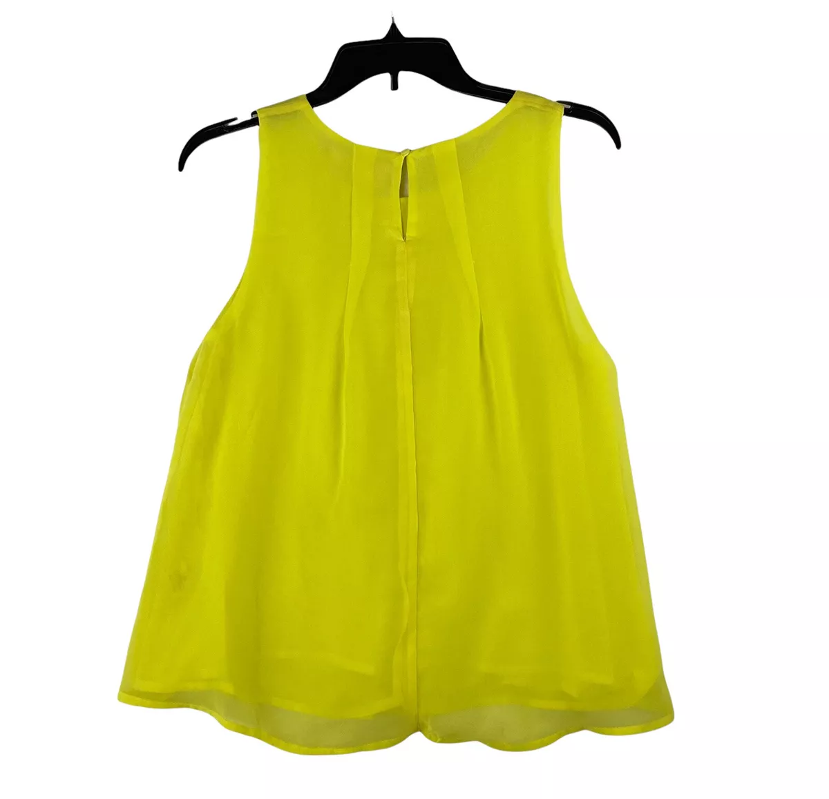 yellow sleeveless blouse