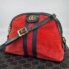 Borsa a tracolla Gucci Ophidia logo GG tela rossa scamosciata donna moda lusso elegante