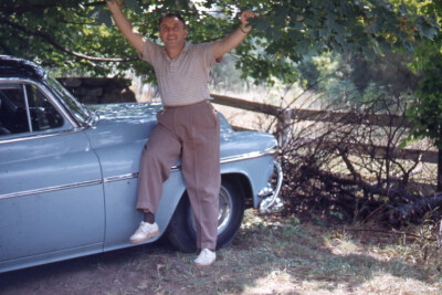 1950s Red Border Kodachrome Slide Man Excited Arms Up on Blue Car