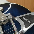 Silver GRETSCH G5655T-QM hollow body electric guitar with black pickguard, hardware, and branded control knob.