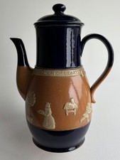 ROYAL DOULTON STONEWARE COFFEE POT DEPICTING NURSERY RHYMES.