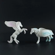 Lot Of 2 Greenbrier International Inc Pegasus Figures plastic Blue & pink
