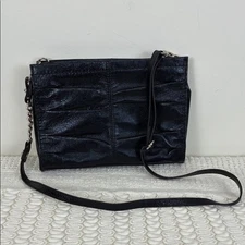 NWOT The Sak Black Onyx Leather Shoulder Bag Demi Clutch Metallic Zipper Purse