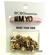 BCBGeneration Pink Gold Tone Letters Bracelet...
