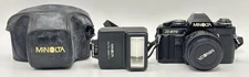 Minolta X-570 35mm SLR Camera with 50mm 1:1.4 Lens w/ Flash & Carrying Case