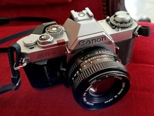 CANON AV1 MADE IN JAPAN NON TESTATO PER USO ESPOSIZIONE /RICAMBI O DA  RIVEDERE 