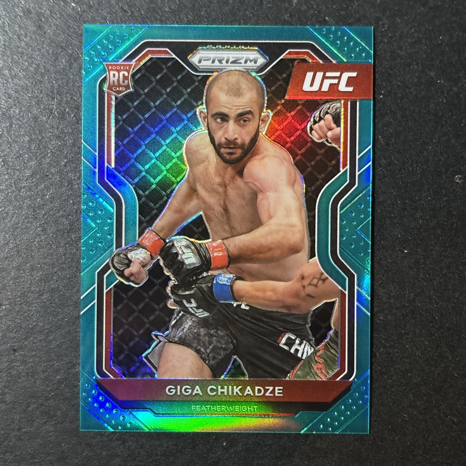 2021 Panini Prizm UFC Giga Chikadze RC Teal Prizm SP #/49 No. 72