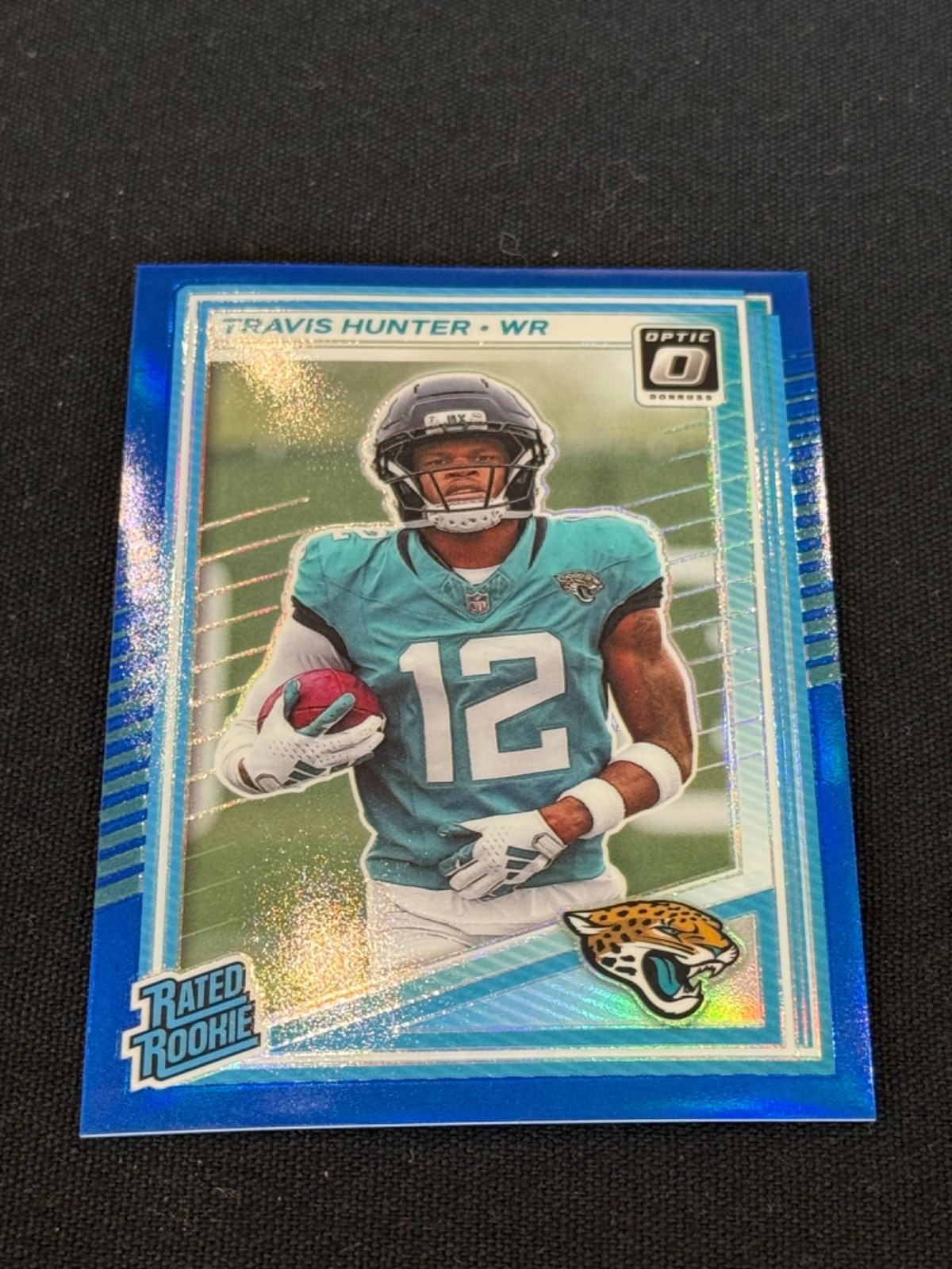 2025 Panini Donruss Optic Travis Hunter RC Blue /249 Rated Rookie #201