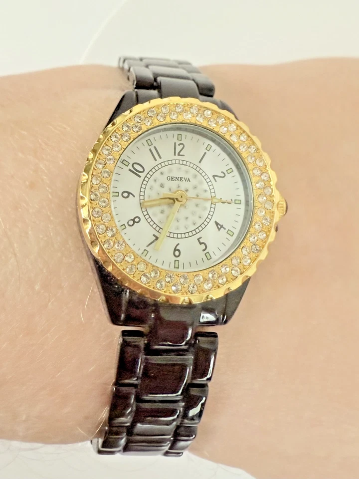 Reloj de cuarzo Geneva para mujer - Correa de cerámica negra con bisel de cristal dorado Foto 2 de 4