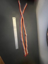 VINTAGE YOUTH RAINBOW SUSPENDERS with red hand clasps.