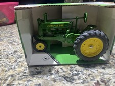 Ertl 1:16 diecast replica of the 1934 John Deere Model A tractor NIB