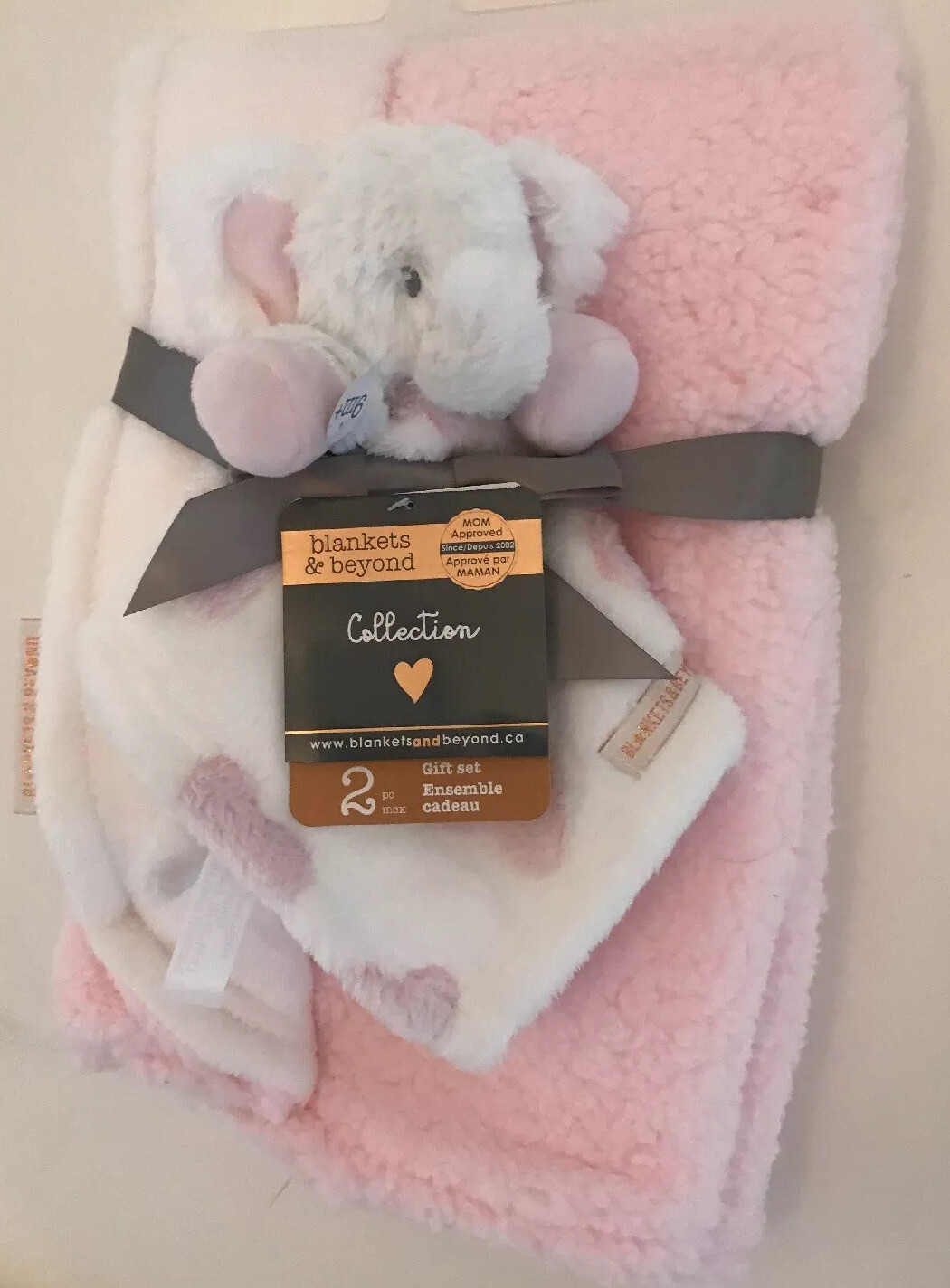 Coperta di peluche rosa e bianca e piumone elefante bianco da coperte e oltre