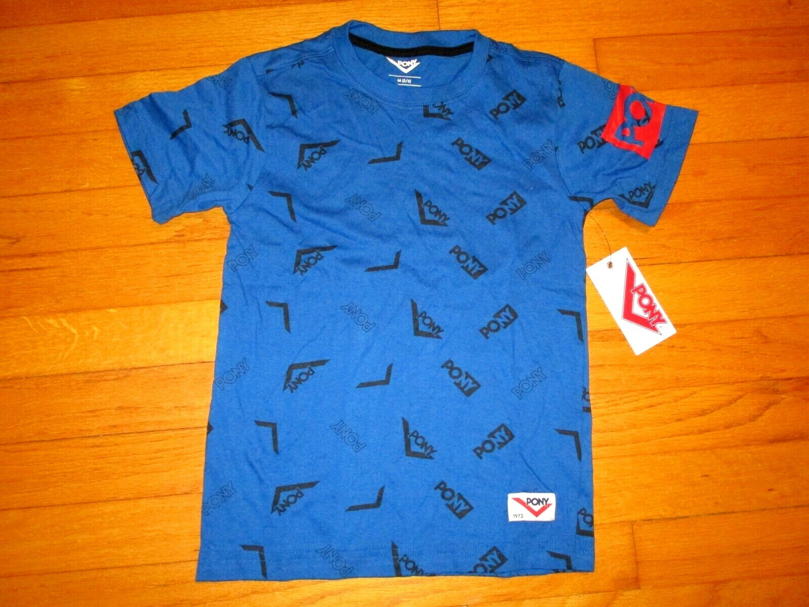 T shirt ragazzo nuova con etichetta ($22) marca PONY logo grafico taglia 5 6