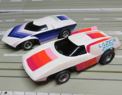 H0 Slotcar Racing Modellbahn ~~ 2 Lazer mit AFX Chassis + 4 Schleifer #EBS839