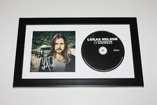 LUKAS NELSON SIGNED FRAMED CD COVER BOOKLET w/COA PROMISE OF THE REAL SOMETHING