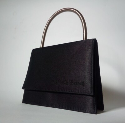 Marella Ferrera haut couture design black purse Barcelona