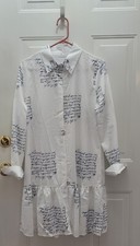 NWOT PRINT RUFFLE HEM DRESS. SIZE LARGE.  BUTTON FRONT, LAPEL COLLAR. 