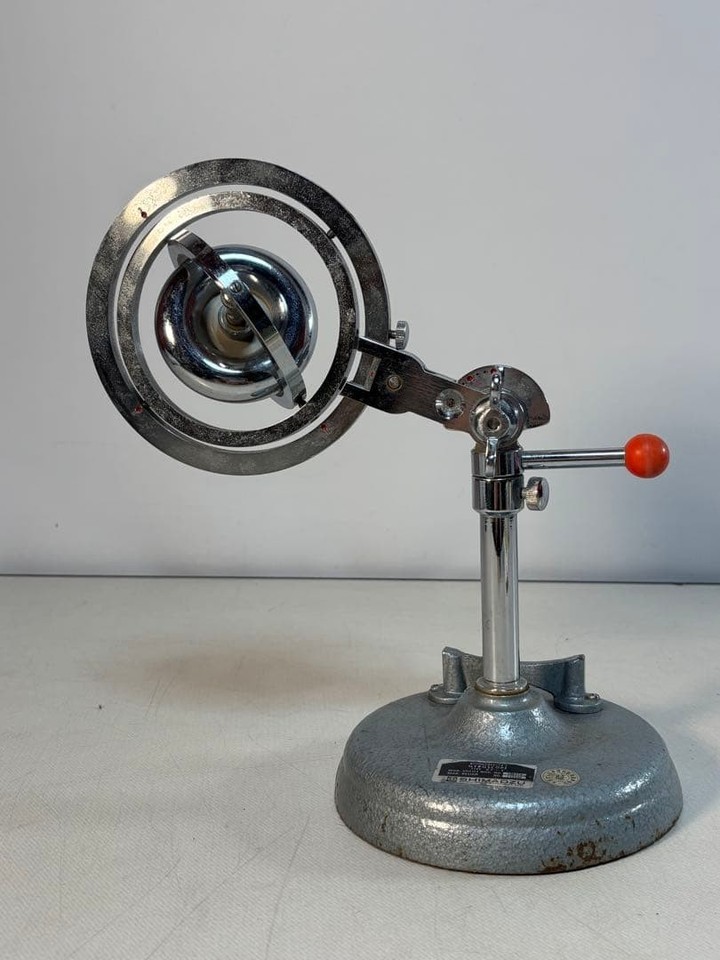 A real brass-and-steel Shimadzu gyroscope from Japan — the kind of precision scientific instrument that looks incredible on a desk and actually demonstrates physics.