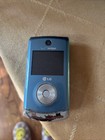 New ListingLg Verizon Chocolate 3 Light Blue Flip Phone. With Battery.