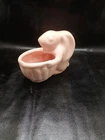 Shawnee Pottery 4" Long Pink Rabbit Holding a Basket Planter in Good Condition.