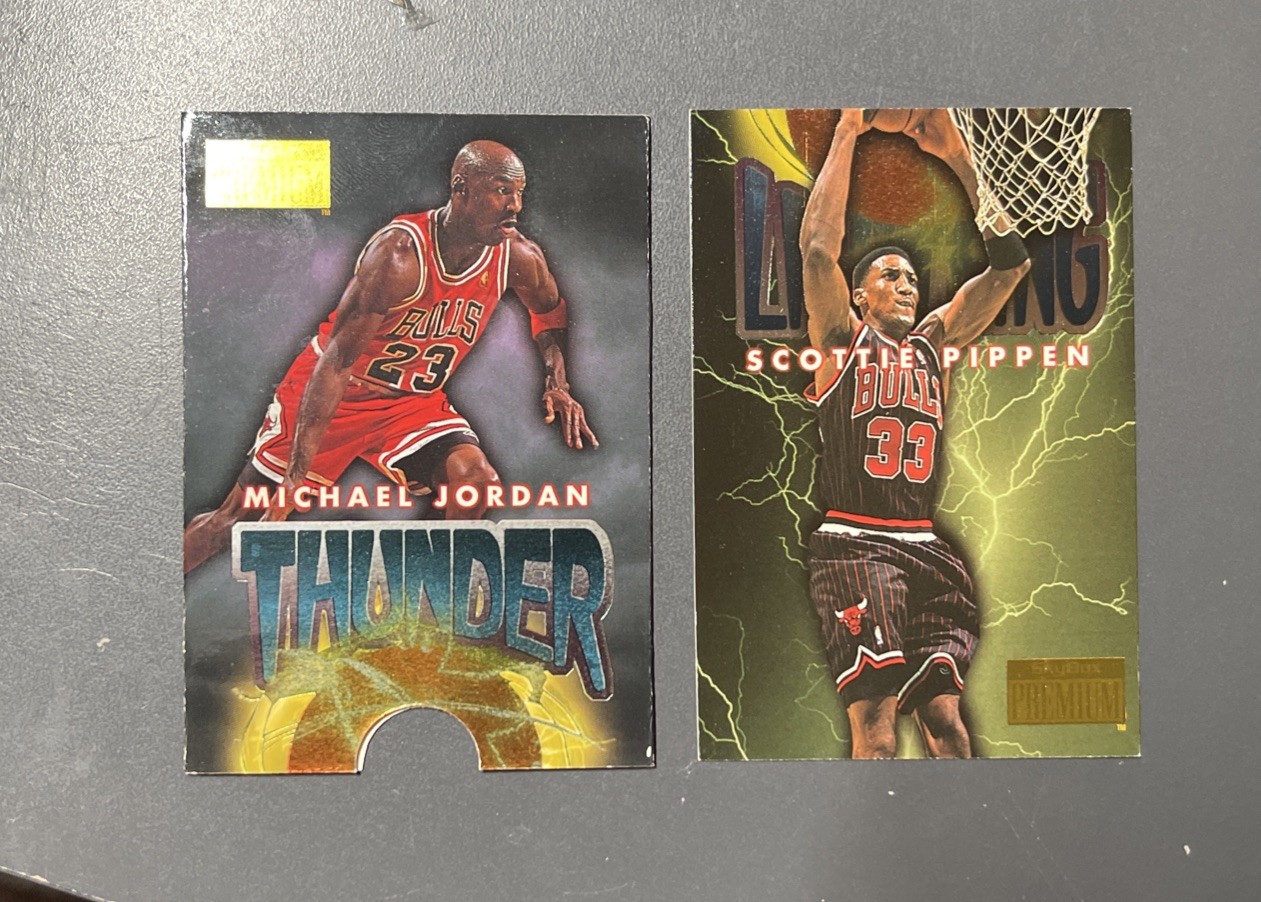 Michael Jordan #1 (Basketball Cards 1996 Skybox Premium Thunder and Lightning) — is it worth grading?