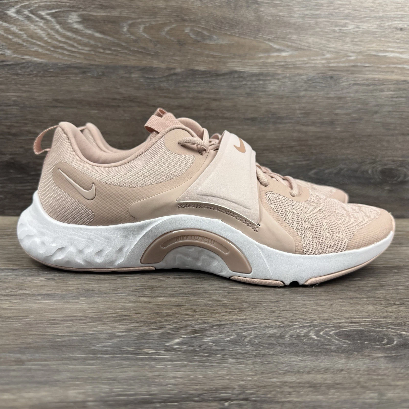 Scarpe sneakers da corsa Nike donna Renew In Season TR 12 rosa bianco taglia 12