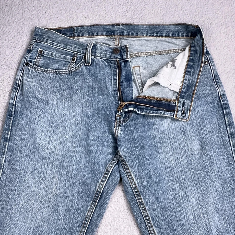 Pantalones de mezclilla Levis 569 para hombre 34x32 azul lavado claro sueltos rectos cremallera mosca lengüeta roja Foto 3 de 4