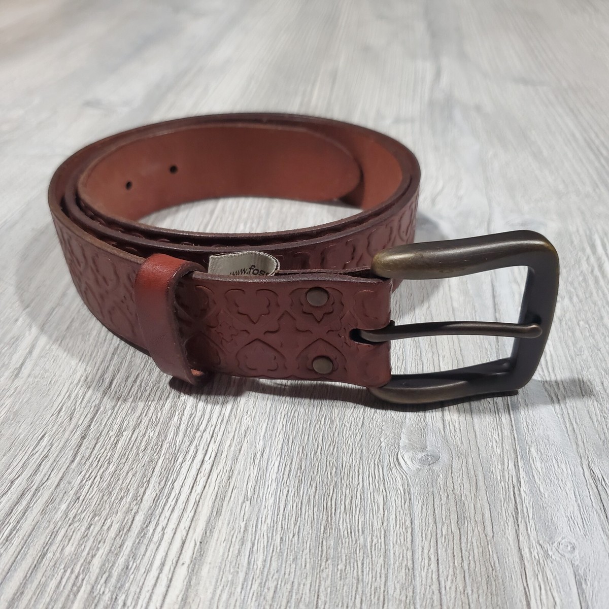 Fossil unisex Brown Embossed Leather Belt size L Amazon.com: Fossil Men main image 3