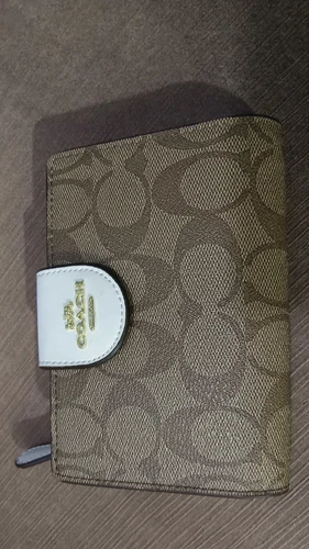 Portafoglio Coach medio con zip angolare in tela firmato CW786