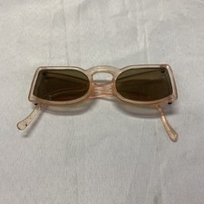 Vintage 1960s Child Sunglasses In A Pink Transparent Frame