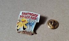 pin's Rantigny roller rat (base dorée non signée) hauteur: 2,5 cm