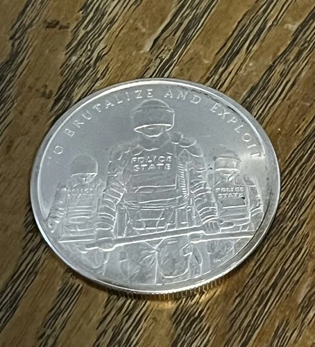 2015 1oz .999 SILVER SHIELD - SLAVE POLICE STATE - TO BRUTALIZE AND EXPLOIT - BU