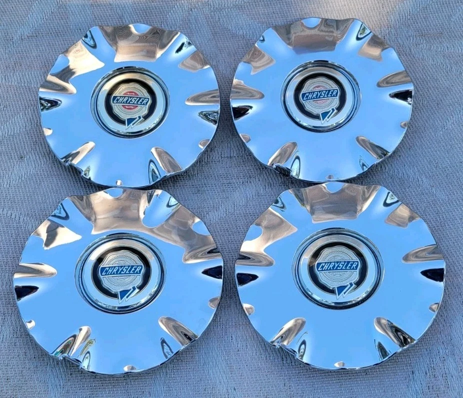 TAPA CENTRAL CHRYSLER SEBRING (1) CROMADA OEM PESTAÑAS USADAS BUENAS #04782269AC H#2144B Foto 2 de 4