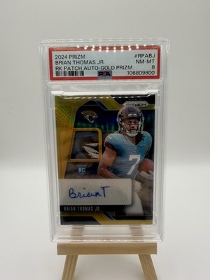 2024 Panini Prizm - Rookie Patch Autographs Brian Thomas Jr. Gold Prizm /10