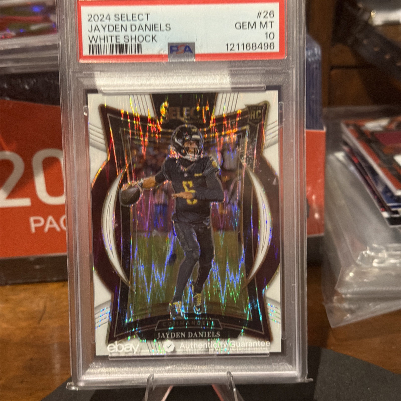 2024 Panini Select - Concourse Jayden Daniels #26 White Shock Prizm /199 (RC)