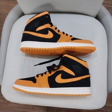 jordan 1 mid black orange peel
