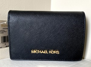 MK jet set wallet
