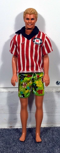 Ken Doll with 1968 body and a 1991 head original Ken clothes 12"